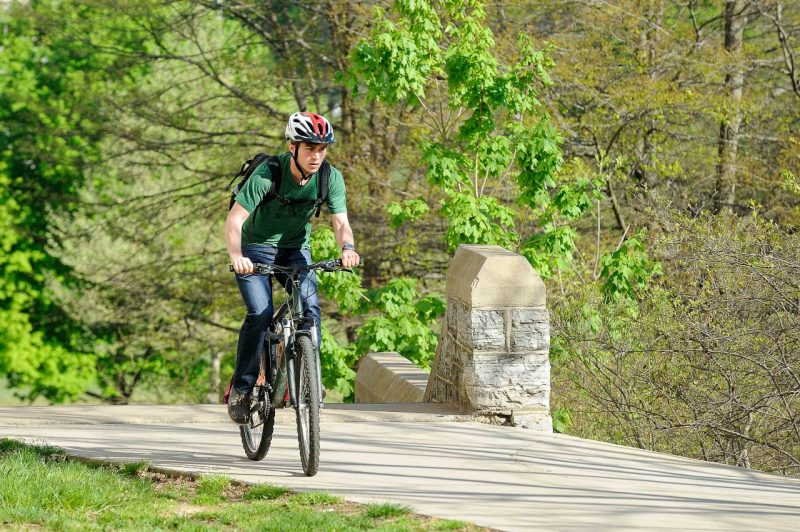 bike rider on Virginia Tech's campus in the summer 